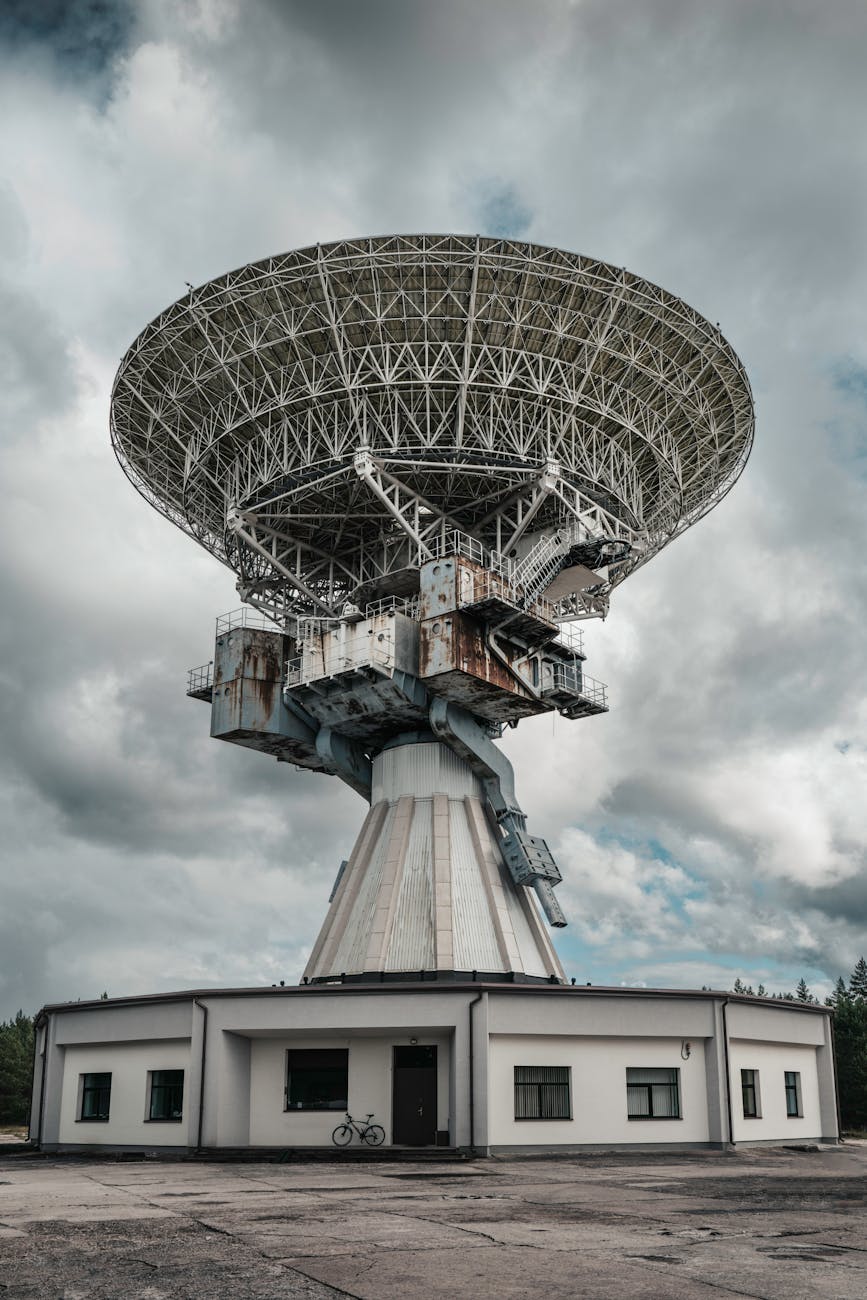 massive radio telescope amidst dramatic skies
