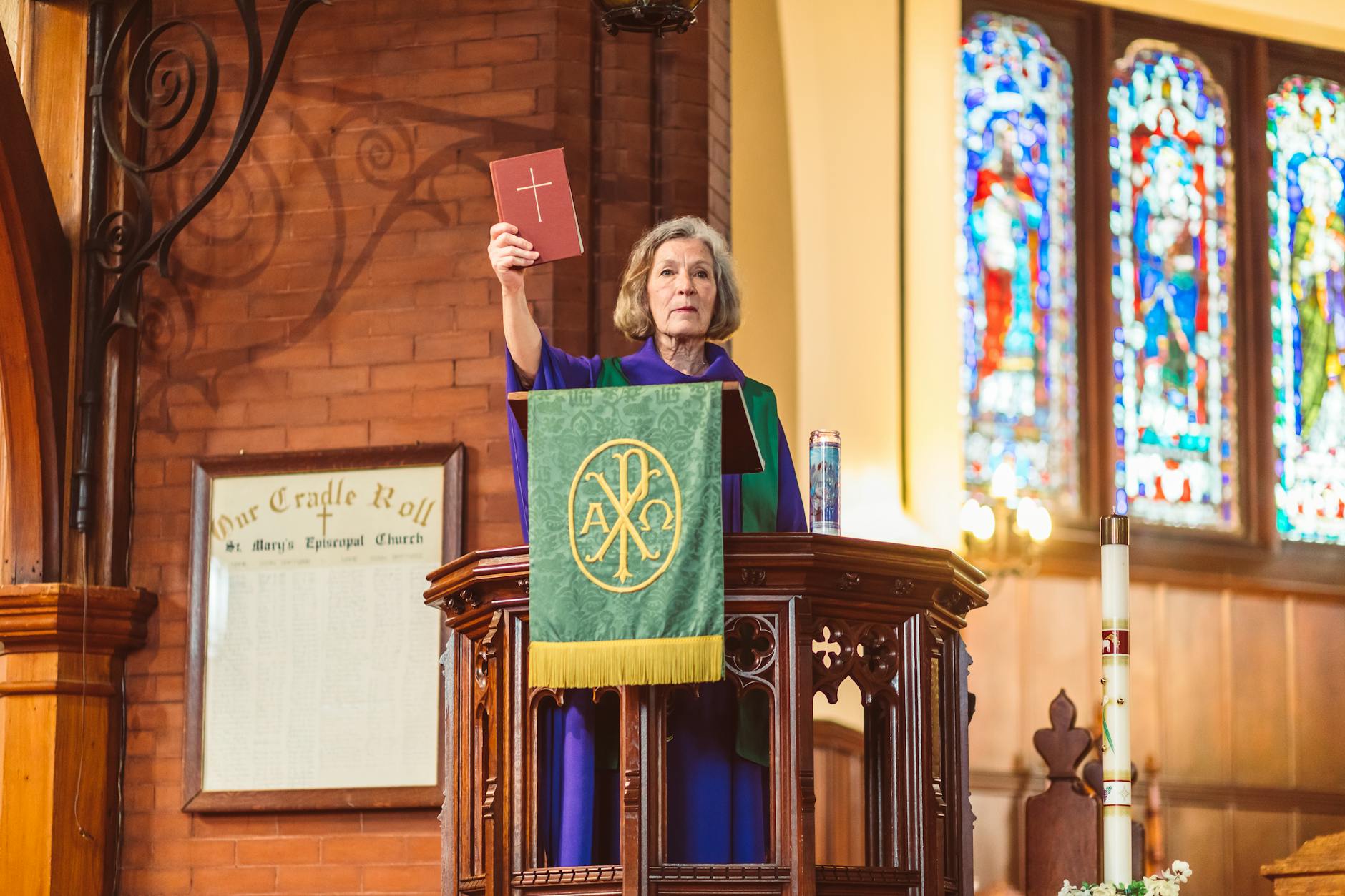 female priest on a pulpit